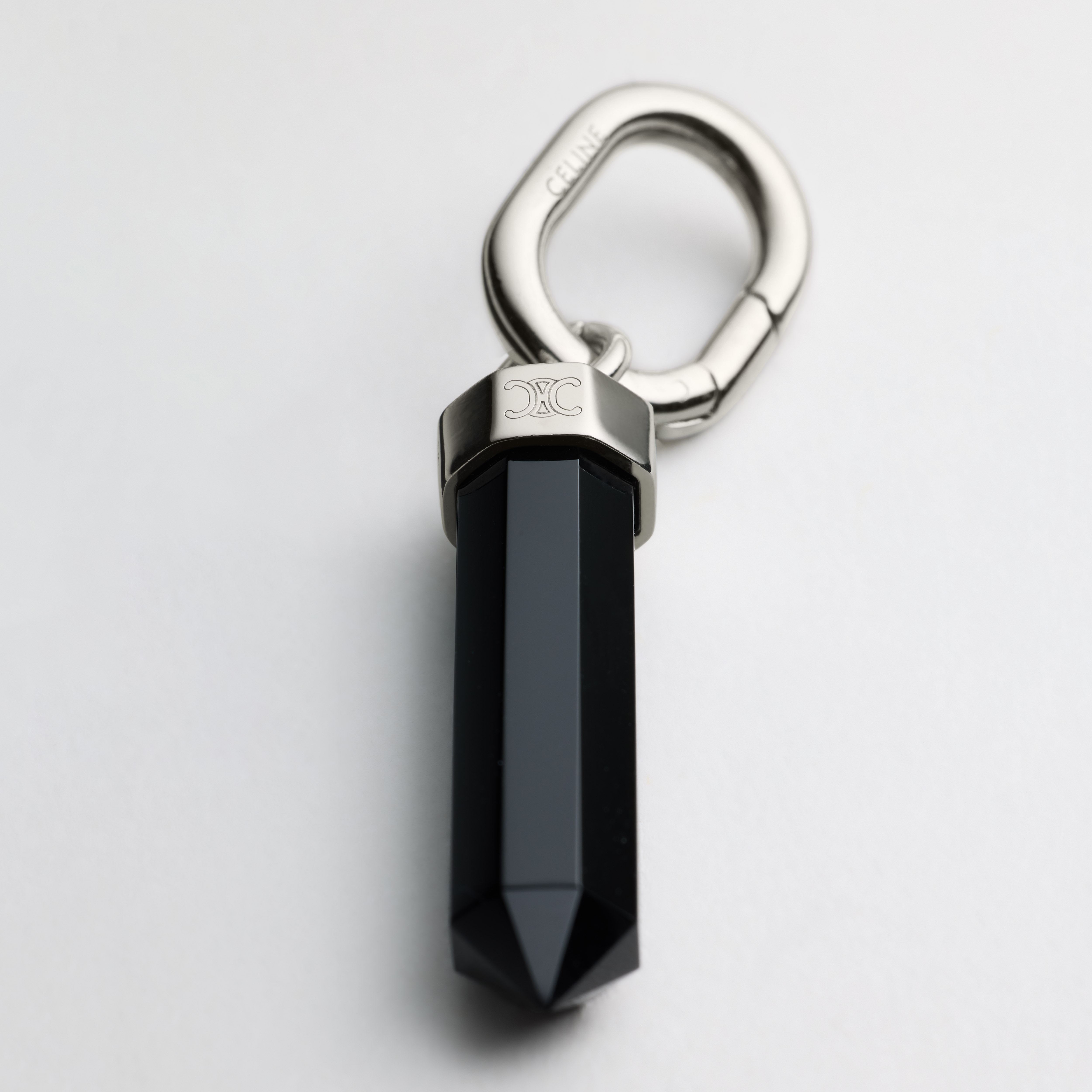CELINE CHARMS PENDULUM STONE IN ONYX AND BRASS WITH RHODIUM FINISH